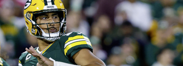 Green Bay Packers QB Love launches a touchdown pass in an NFL game