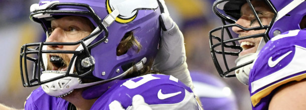 Minnesota Vikings TE Hockenson catches a touchdown pass in an NFL game