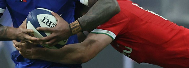 Rugby players battle for the ball