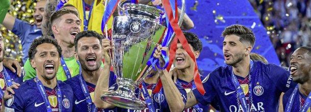 Soccer players from PSG celebrate winning the UEFA Champions League
